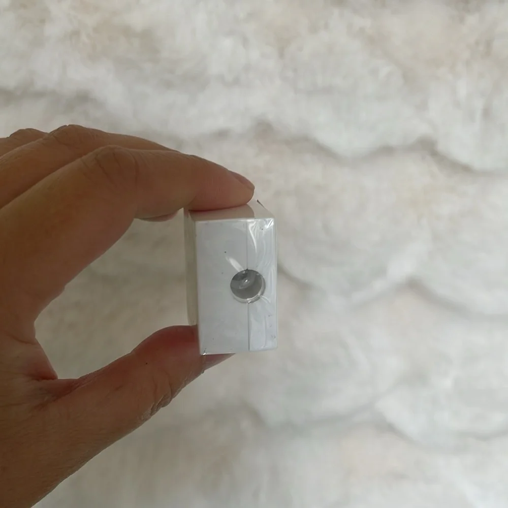 White eyeliner sharpener with Signature Logo